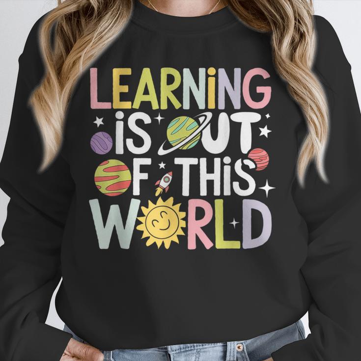 Learning Is Out Of This World Space Teacher Cute Groovy Unisex Sweatshirt, novelty gifts, funny gifts