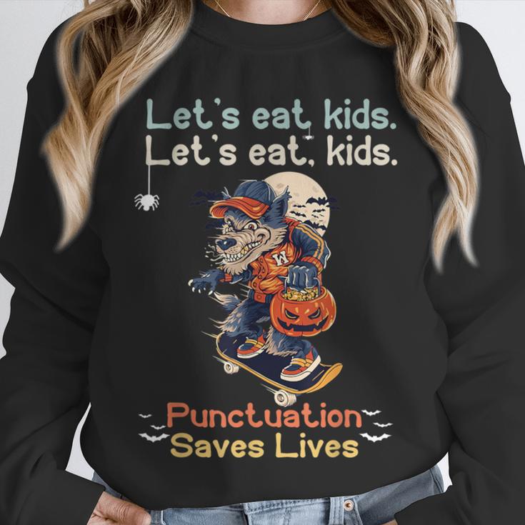 Let's Eat Kids Grammar Werewolf Halloween Teacher Unisex Sweatshirt, novelty gifts, funny gifts Let's Eat Kids Grammar Werewolf Halloween Teacher Unisex Sweatshirt, novelty gifts, funny gifts