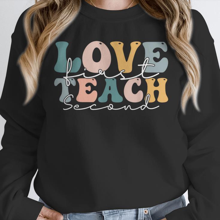 Love First Teach Second School Teacher Appreciation Unisex Sweatshirt, novelty gifts, funny gifts