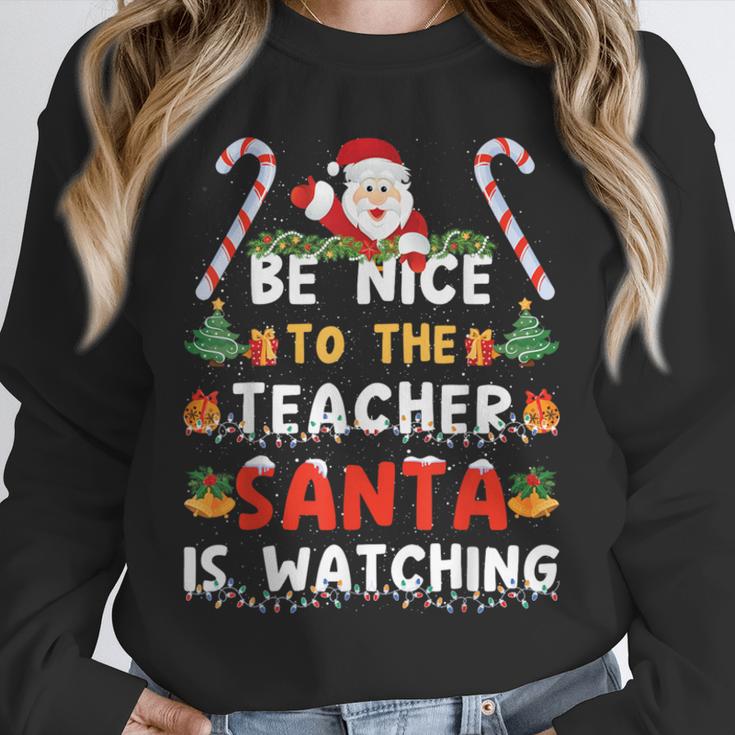 Be Nice To The Teacher Santa Is Watching Christmas Unisex Sweatshirt, novelty gifts, funny gifts Be Nice To The Teacher Santa Is Watching Christmas Unisex Sweatshirt, novelty gifts, funny gifts