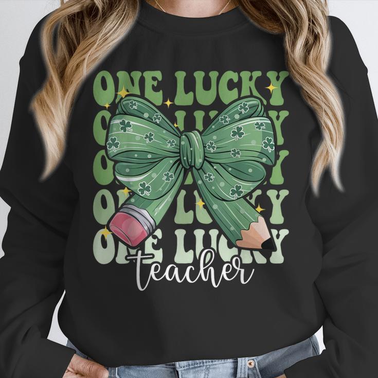 One Lucky Teacher Coquette Bow St Patricks Day Teacher Unisex Sweatshirt, novelty gifts, funny gifts