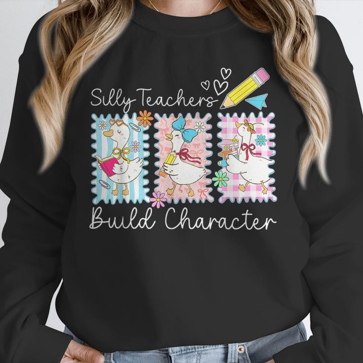 Preppy Silly Teacher Goose Build Character Back To School Unisex Sweatshirt, novelty gifts, funny gifts Preppy Silly Teacher Goose Build Character Back To School Unisex Sweatshirt, novelty gifts, funny gifts