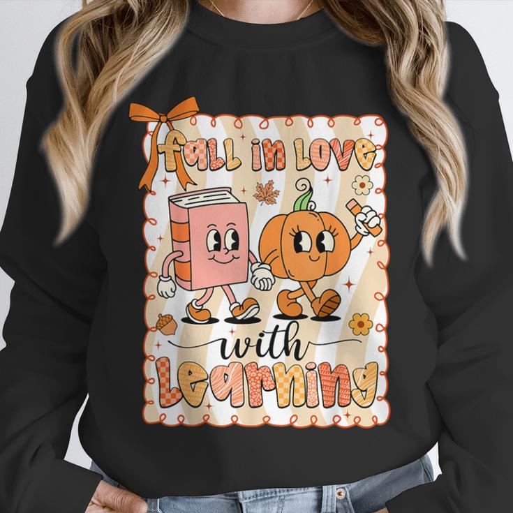 Pumpkin Teacher Preppy Fall In Love With Learning Autumn Unisex Sweatshirt, novelty gifts, funny gifts Pumpkin Teacher Preppy Fall In Love With Learning Autumn Unisex Sweatshirt, novelty gifts, funny gifts