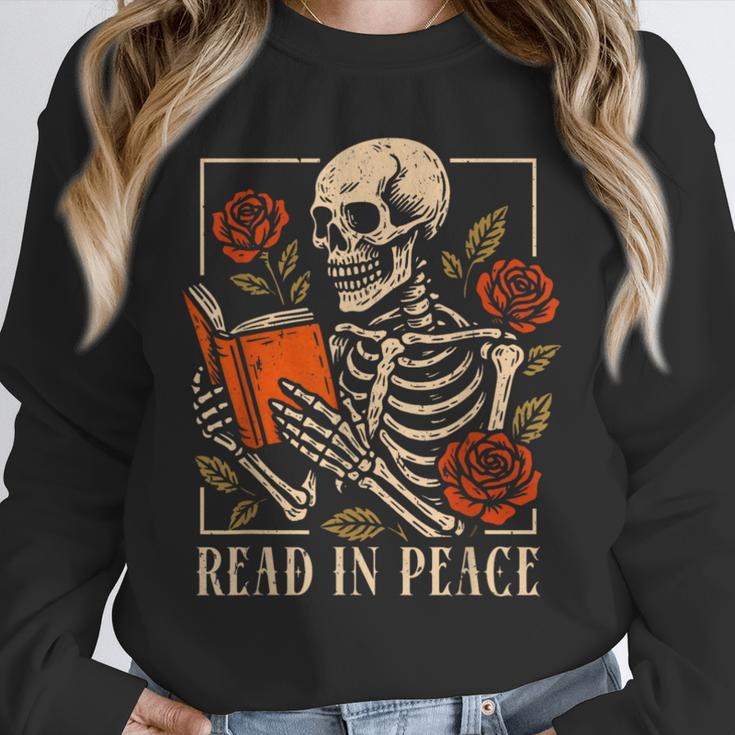 Read In Peace Skeleton Reading Book Halloween Teacher Unisex Sweatshirt, novelty gifts, funny gifts Read In Peace Skeleton Reading Book Halloween Teacher Unisex Sweatshirt, novelty gifts, funny gifts