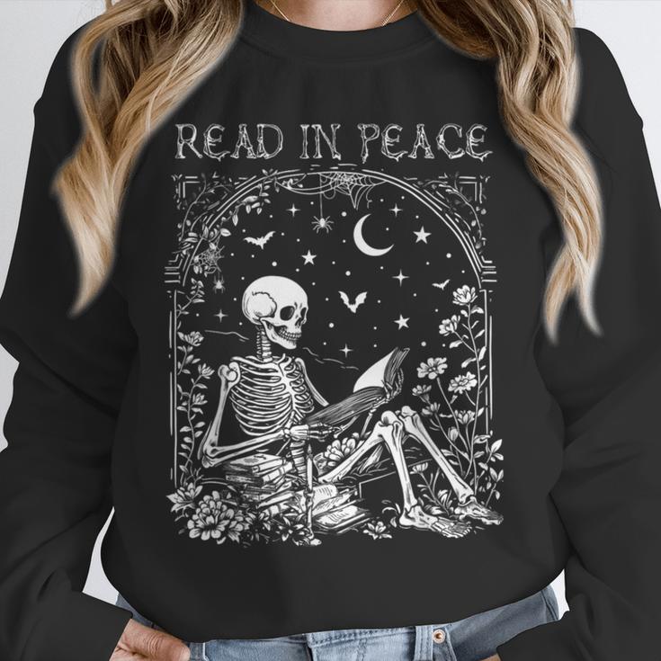 Read In Peace Skeleton Reading Teacher Spooky Halloween Unisex Sweatshirt, novelty gifts, funny gifts Read In Peace Skeleton Reading Teacher Spooky Halloween Unisex Sweatshirt, novelty gifts, funny gifts