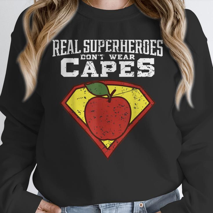 Real Superheroes Don't Wear Capes Teacher Shirt Teaching Te Unisex Sweatshirt, novelty gifts, funny gifts Real Superheroes Don't Wear Capes Teacher Shirt Teaching Te Unisex Sweatshirt, novelty gifts, funny gifts