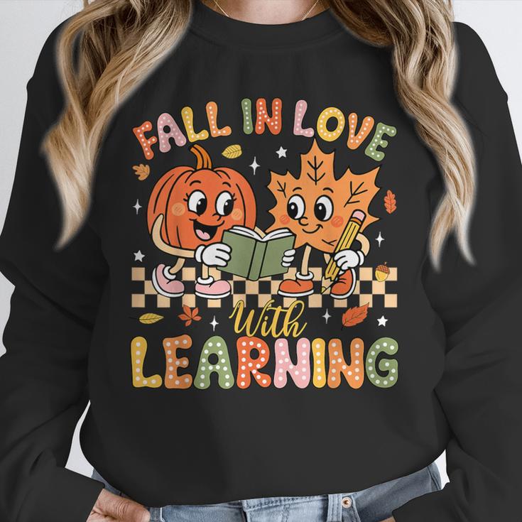 Retro Fall In Love With Learning Autumn Pumpkin Teacher Kids Unisex Sweatshirt, novelty gifts, funny gifts Retro Fall In Love With Learning Autumn Pumpkin Teacher Kids Unisex Sweatshirt, novelty gifts, funny gifts