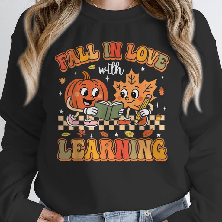 Retro Fall In Love With Learning Autumn Pumpkin Teachers Unisex Sweatshirt, novelty gifts, funny gifts Retro Fall In Love With Learning Autumn Pumpkin Teachers Unisex Sweatshirt, novelty gifts, funny gifts