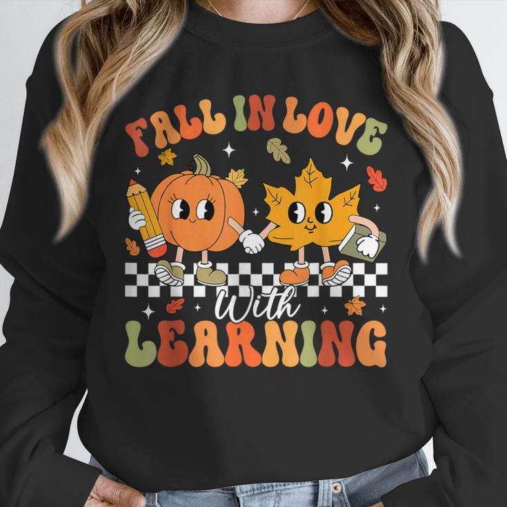 Retro Pumpkin Fall In Love With Learning Autumn Teacher Unisex Sweatshirt, novelty gifts, funny gifts Retro Pumpkin Fall In Love With Learning Autumn Teacher Unisex Sweatshirt, novelty gifts, funny gifts