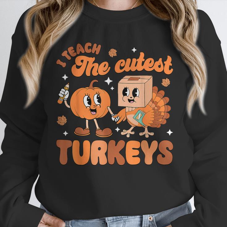 Retro I Teach The Cutest Turkey Thanksgiving Pumpkin Teacher Unisex Sweatshirt, novelty gifts, funny gifts