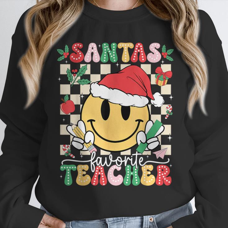 Santas Favorite Teacher Retro Groovy Smile Face Christmas Unisex Sweatshirt, novelty gifts, funny gifts Santas Favorite Teacher Retro Groovy Smile Face Christmas Unisex Sweatshirt, novelty gifts, funny gifts