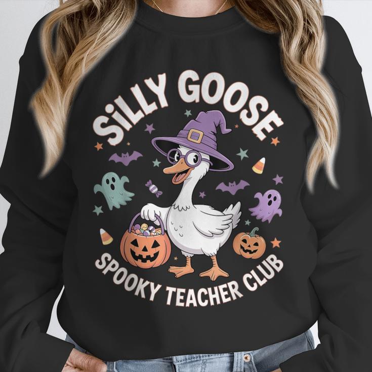 Silly Goose Spooky Teacher Club Halloween Witch Ghost Unisex Sweatshirt, novelty gifts, funny gifts Silly Goose Spooky Teacher Club Halloween Witch Ghost Unisex Sweatshirt, novelty gifts, funny gifts