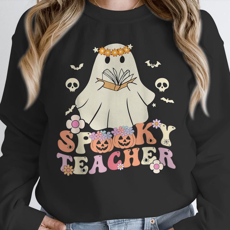 Spooky Teacher Groovy Retro Ghost Teacher Halloween 2023 For Men Women Kids Unisex Sweatshirt, novelty gifts, funny gifts Spooky Teacher Groovy Retro Ghost Teacher Halloween 2023 For Men Women Kids Unisex Sweatshirt, novelty gifts, funny gifts