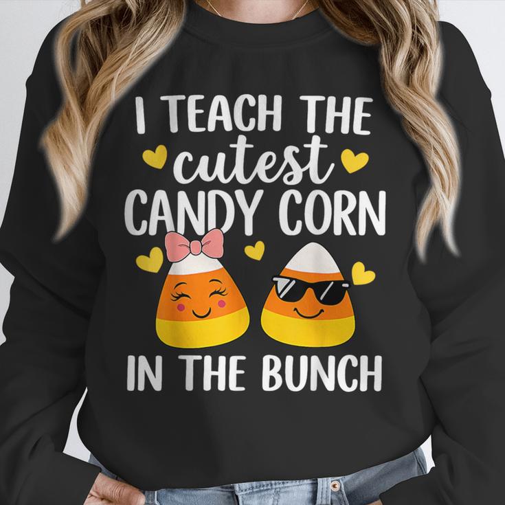 I Teach The Cutest Candy Corn In The Bunch Teacher Halloween Unisex Sweatshirt, novelty gifts, funny gifts