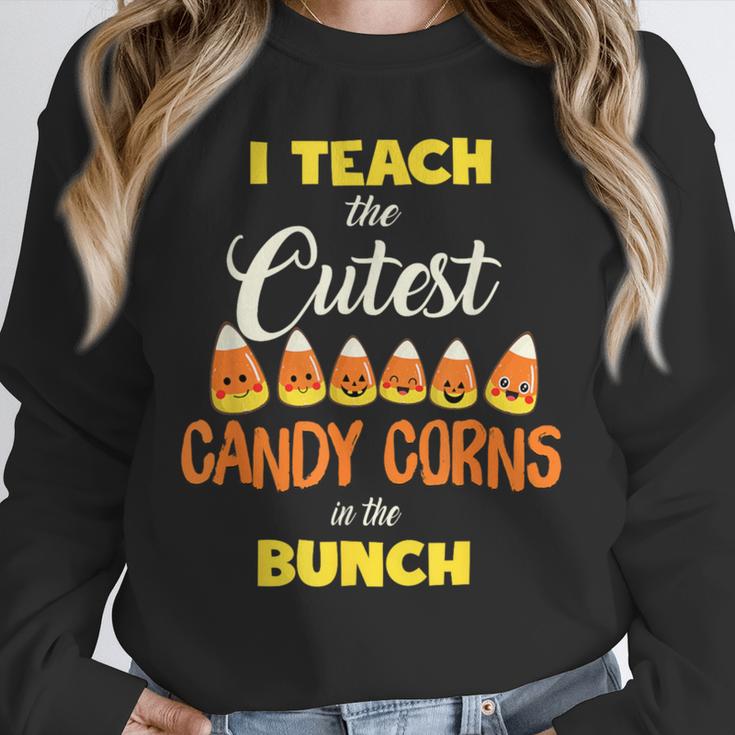 I Teach The Cutest Candy Corn In The Patch Teacher Halloween Unisex Sweatshirt, novelty gifts, funny gifts