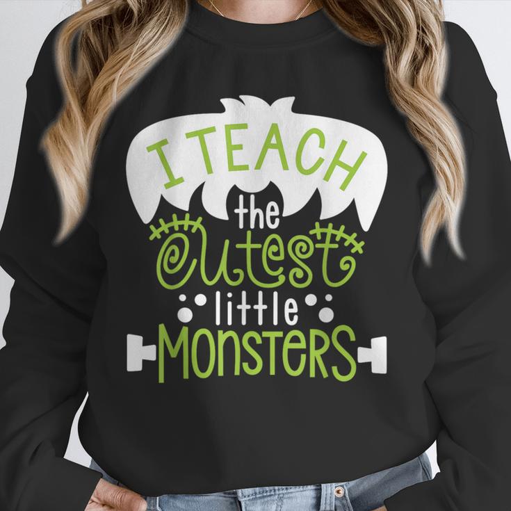 I Teach The Cutest Little Monsters Halloween Teacher Spooky Unisex Sweatshirt, novelty gifts, funny gifts I Teach The Cutest Little Monsters Halloween Teacher Spooky Unisex Sweatshirt, novelty gifts, funny gifts