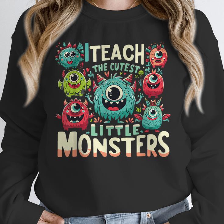 I Teach The Cutest Little Monsters Teacher Halloween Outfit Unisex Sweatshirt, novelty gifts, funny gifts I Teach The Cutest Little Monsters Teacher Halloween Outfit Unisex Sweatshirt, novelty gifts, funny gifts
