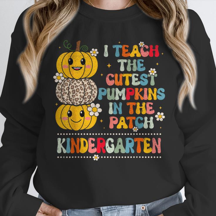 I Teach The Cutest Pumpkins Kindergarten Teacher Halloween Unisex Sweatshirt, novelty gifts, funny gifts I Teach The Cutest Pumpkins Kindergarten Teacher Halloween Unisex Sweatshirt, novelty gifts, funny gifts