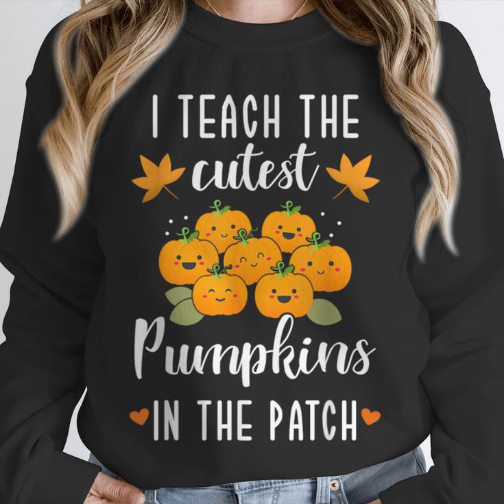I Teach The Cutest Pumpkins In The Patch Halloween Teacher Unisex Sweatshirt, novelty gifts, funny gifts