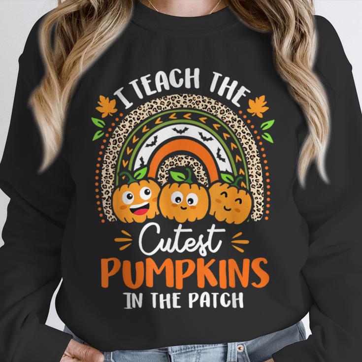 I Teach The Cutest Pumpkins In The Patch Teacher Halloween Unisex Sweatshirt, novelty gifts, funny gifts