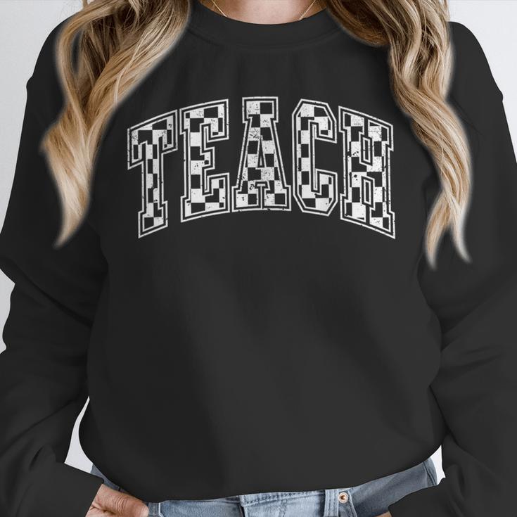 Teach Teacher Checkered First Day Of School Back To School Unisex Sweatshirt, novelty gifts, funny gifts Teach Teacher Checkered First Day Of School Back To School Unisex Sweatshirt, novelty gifts, funny gifts
