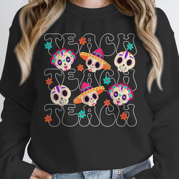 Teach Teacher Dia De Los Muertos Day Of The Dead Sugar Skull Unisex Sweatshirt, novelty gifts, funny gifts Teach Teacher Dia De Los Muertos Day Of The Dead Sugar Skull Unisex Sweatshirt, novelty gifts, funny gifts