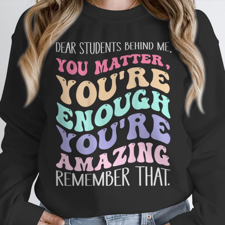 Teacher Dear Students Behind Me 1st Day Of School On Back Unisex Sweatshirt, novelty gifts, funny gifts Teacher Dear Students Behind Me 1st Day Of School On Back Unisex Sweatshirt, novelty gifts, funny gifts
