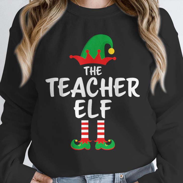 The Teacher Elf Matching Family Christmas Unisex Sweatshirt, novelty gifts, funny gifts The Teacher Elf Matching Family Christmas Unisex Sweatshirt, novelty gifts, funny gifts