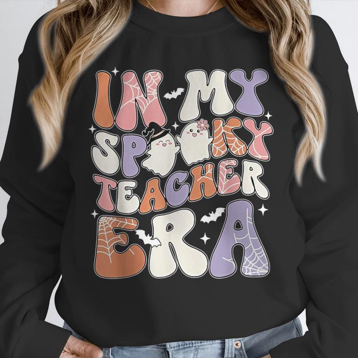 Teacher Halloween In My Spooky Teacher Era Retro Groovy Unisex Sweatshirt, novelty gifts, funny gifts Teacher Halloween In My Spooky Teacher Era Retro Groovy Unisex Sweatshirt, novelty gifts, funny gifts