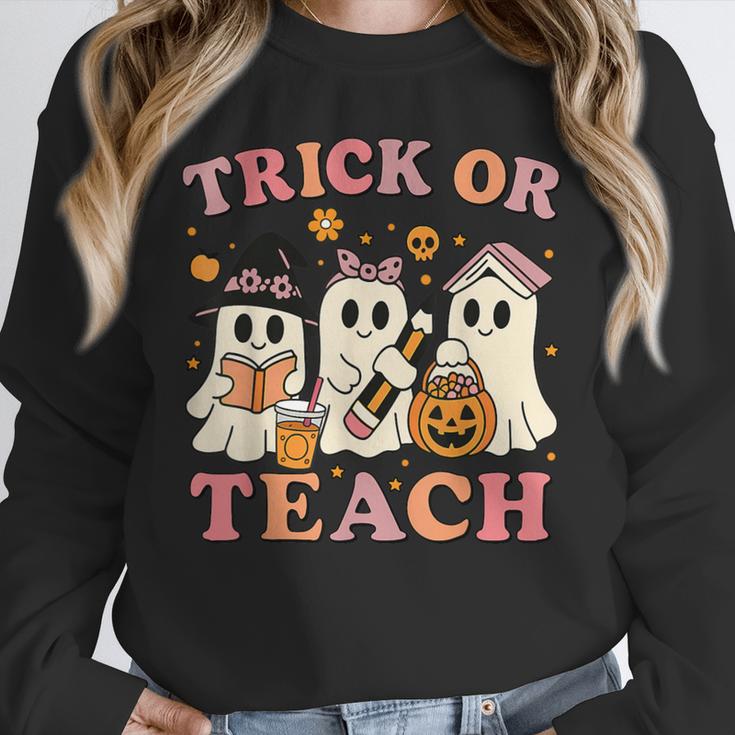 Teacher Halloween Trick Or Teach Cute Ghost Coffee Pumpkins Unisex Sweatshirt, novelty gifts, funny gifts Teacher Halloween Trick Or Teach Cute Ghost Coffee Pumpkins Unisex Sweatshirt, novelty gifts, funny gifts