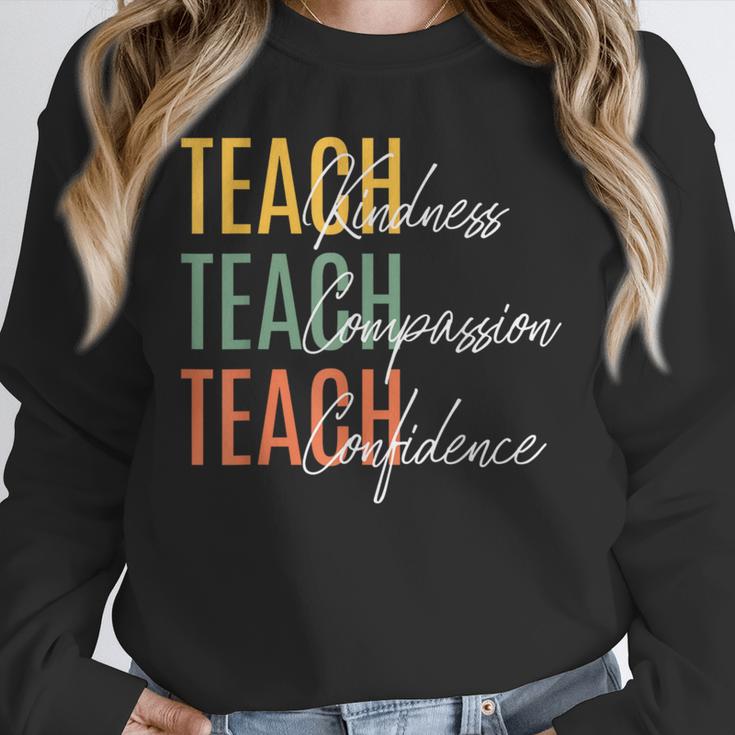Teacher Kindness Compassion Confidence Teaching Unisex Sweatshirt, novelty gifts, funny gifts Teacher Kindness Compassion Confidence Teaching Unisex Sweatshirt, novelty gifts, funny gifts