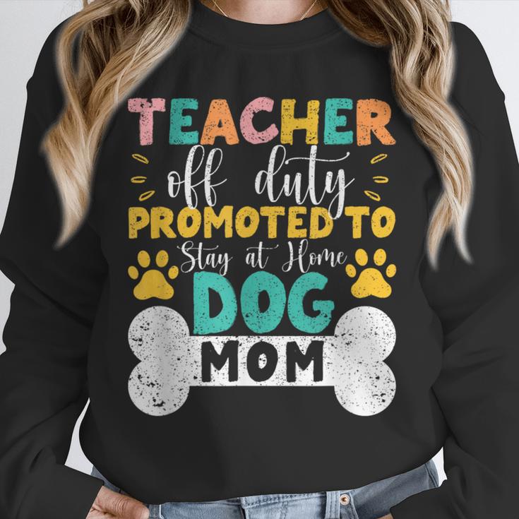 Teacher Off Duty Promoted To Stay At Home Dog Mom Teachers Unisex Sweatshirt, novelty gifts, funny gifts