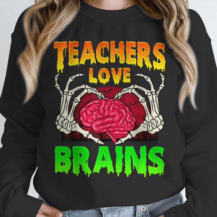 Teacher Teachers Love Brains Skeleton Hand Heart Halloween Unisex Sweatshirt, novelty gifts, funny gifts Teacher Teachers Love Brains Skeleton Hand Heart Halloween Unisex Sweatshirt, novelty gifts, funny gifts