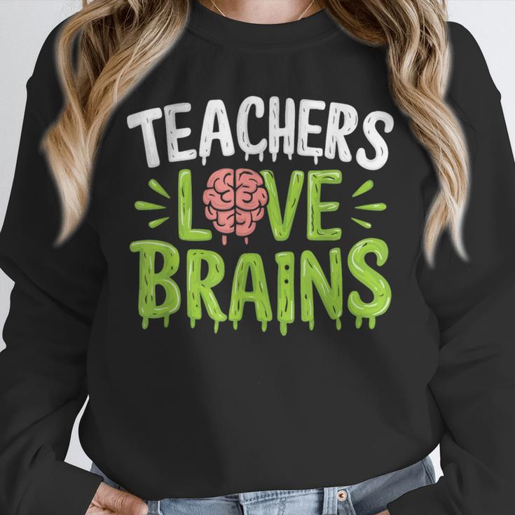 Teachers Love Brains Halloween Teacher Zombie Unisex Sweatshirt, novelty gifts, funny gifts Teachers Love Brains Halloween Teacher Zombie Unisex Sweatshirt, novelty gifts, funny gifts