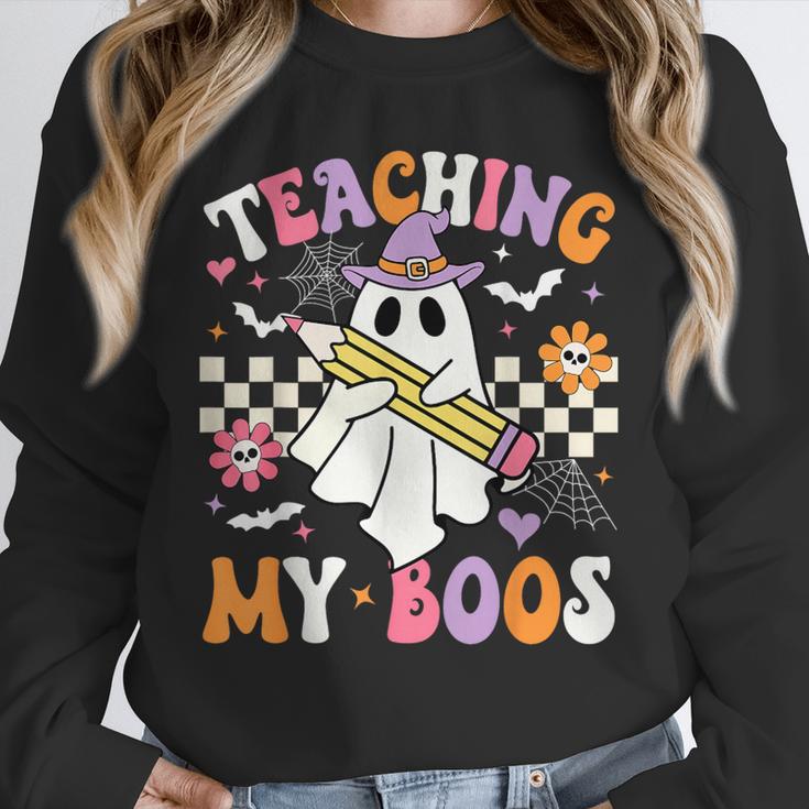 Teaching My Boos Ghost Teacher Cute Groovy Halloween Teacher Unisex Sweatshirt, novelty gifts, funny gifts