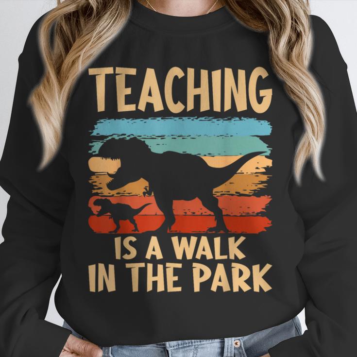 Teaching Is a Walk In Park Dinosaur Teacher Unisex Sweatshirt, novelty gifts, funny gifts