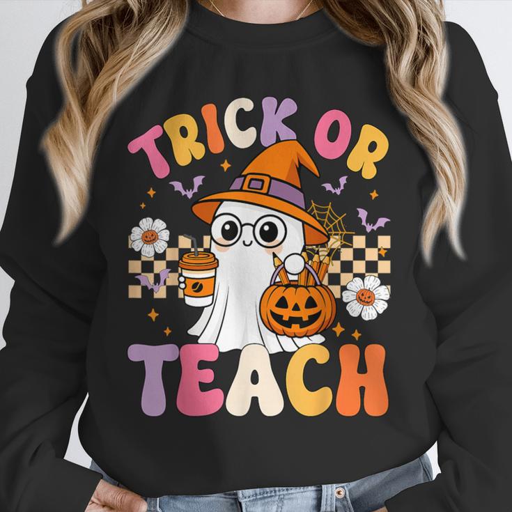 Trick Or Teach Cute Ghost Coffee Pumpkins Halloween Teacher Unisex Sweatshirt, novelty gifts, funny gifts Trick Or Teach Cute Ghost Coffee Pumpkins Halloween Teacher Unisex Sweatshirt, novelty gifts, funny gifts
