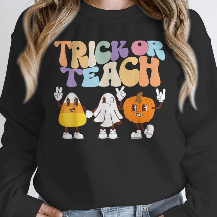 Trick Or Teach Cute Halloween Teacher Unisex Sweatshirt, novelty gifts, funny gifts