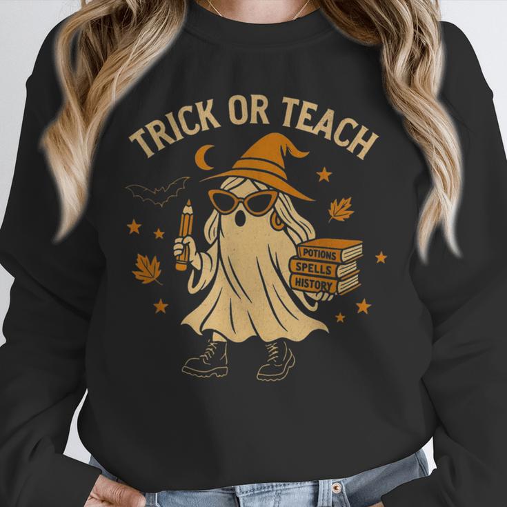 Trick Or Teach Halloween Teacher Unisex Sweatshirt, novelty gifts, funny gifts