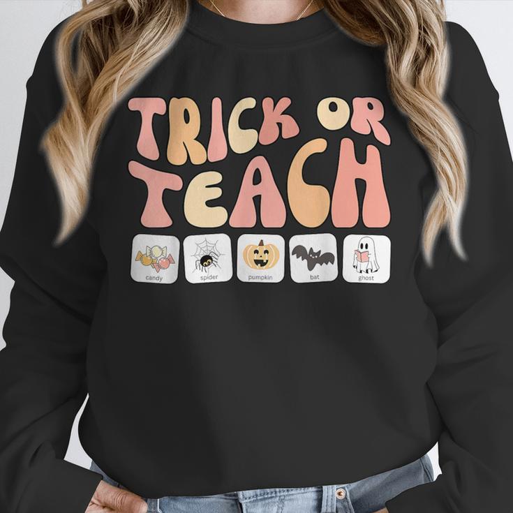 Trick Or Teach With Symbols Special Education Teacher Spooky Unisex Sweatshirt, novelty gifts, funny gifts Trick Or Teach With Symbols Special Education Teacher Spooky Unisex Sweatshirt, novelty gifts, funny gifts