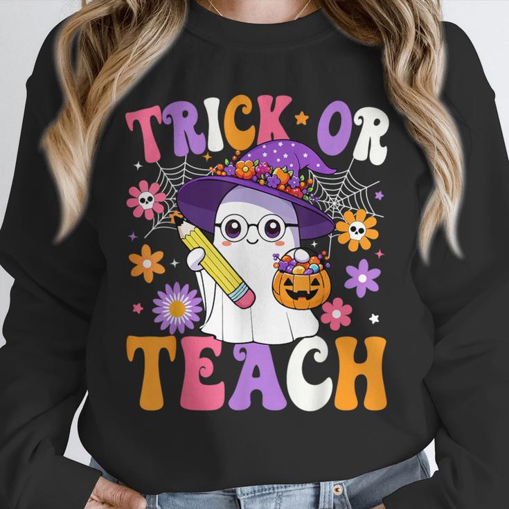 Trick Or Teach Teacher Ghost Teaching Fun Halloween Teacher Unisex Sweatshirt, novelty gifts, funny gifts Trick Or Teach Teacher Ghost Teaching Fun Halloween Teacher Unisex Sweatshirt, novelty gifts, funny gifts