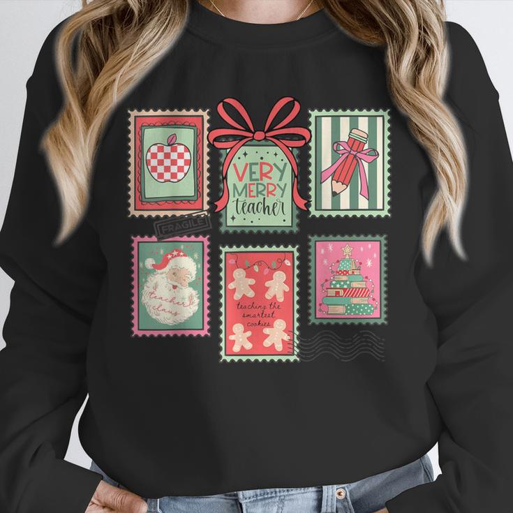 Vintage Preppy Very Merry Teacher Santa Stamps Christmas Unisex Sweatshirt, novelty gifts, funny gifts Vintage Preppy Very Merry Teacher Santa Stamps Christmas Unisex Sweatshirt, novelty gifts, funny gifts