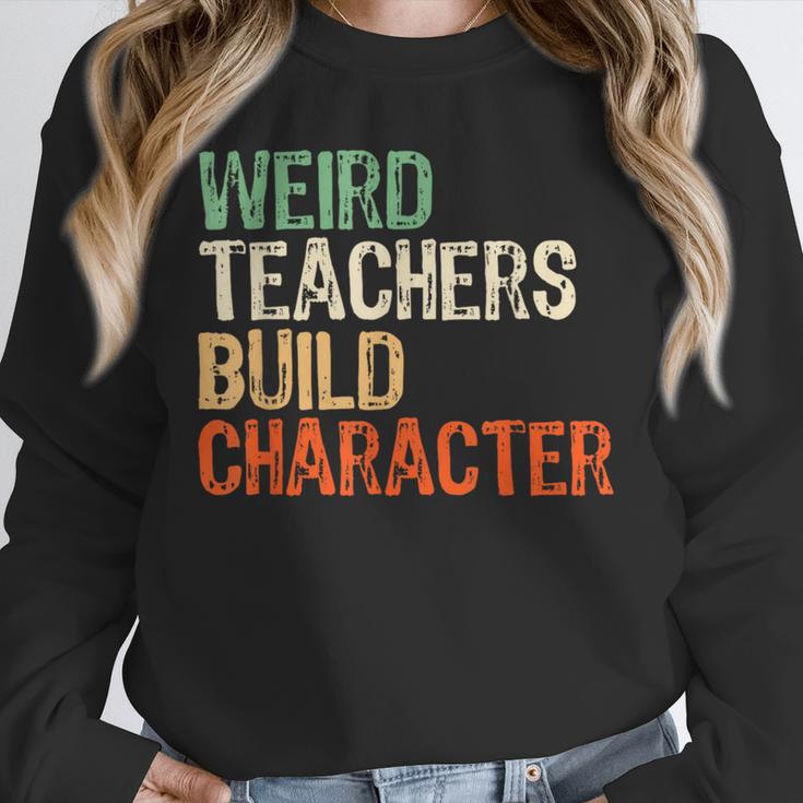 Weird Teachers Build Character Teacher Appreciation Week Day Unisex Sweatshirt, novelty gifts, funny gifts Weird Teachers Build Character Teacher Appreciation Week Day Unisex Sweatshirt, novelty gifts, funny gifts