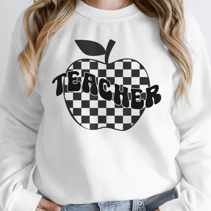 Back To School Checkered Apple Teacher Checkerboard Teacher For Men Women Girls Kids Unisex Sweatshirt, novelty gifts, funny gifts Back To School Checkered Apple Teacher Checkerboard Teacher For Men Women Girls Kids Unisex Sweatshirt, novelty gifts, funny gifts