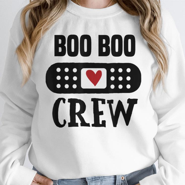 Boo Boo Crew First Aid School Nurse Day Care Teacher Unisex Sweatshirt, novelty gifts, funny gifts Boo Boo Crew First Aid School Nurse Day Care Teacher Unisex Sweatshirt, novelty gifts, funny gifts