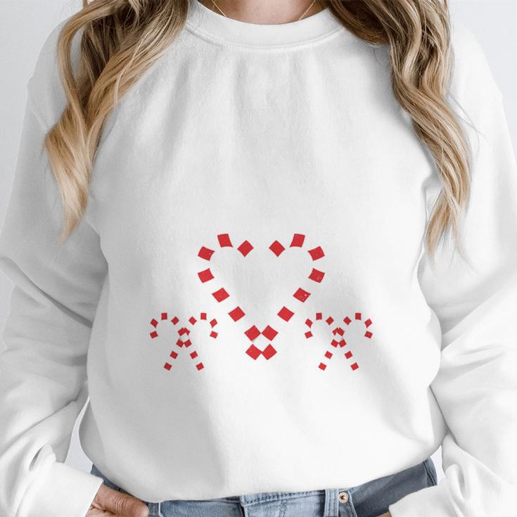 Christmas Candy Cane Work Of Heart Fourth 4th Grade Teacher Unisex Sweatshirt, novelty gifts, funny gifts