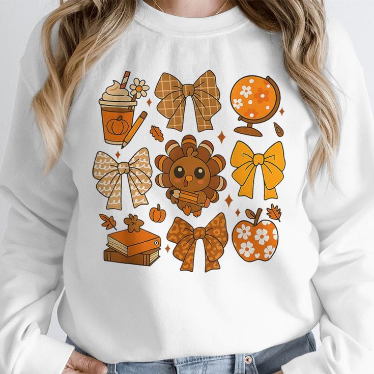 Coquette Teach Teacher Bows Thanksgiving Turkey Fall Autumn Unisex Sweatshirt, novelty gifts, funny gifts