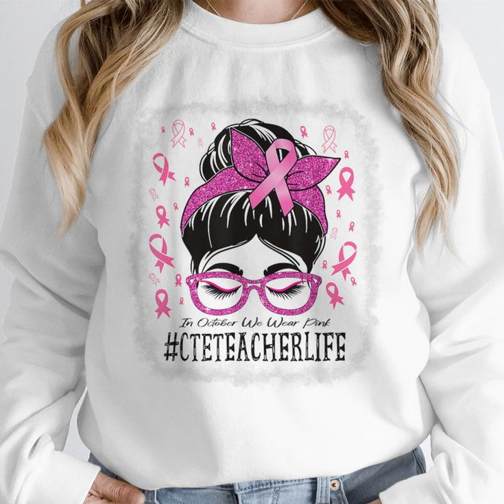 CTE Teacher In October We Wear Pink Breast Cancer Awareness Unisex Sweatshirt, novelty gifts, funny gifts CTE Teacher In October We Wear Pink Breast Cancer Awareness Unisex Sweatshirt, novelty gifts, funny gifts