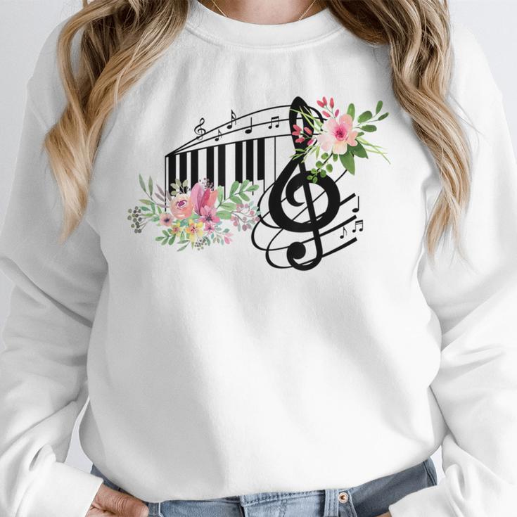 Cut Music Teacher Shirt With a Piano Keys Notes And Flowers Unisex Sweatshirt, novelty gifts, funny gifts Cut Music Teacher Shirt With a Piano Keys Notes And Flowers Unisex Sweatshirt, novelty gifts, funny gifts