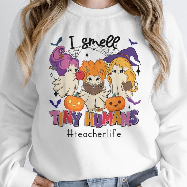 Halloween Teacher Smell a Tiny Human Ghost Spooky Season Unisex Sweatshirt, novelty gifts, funny gifts Halloween Teacher Smell a Tiny Human Ghost Spooky Season Unisex Sweatshirt, novelty gifts, funny gifts